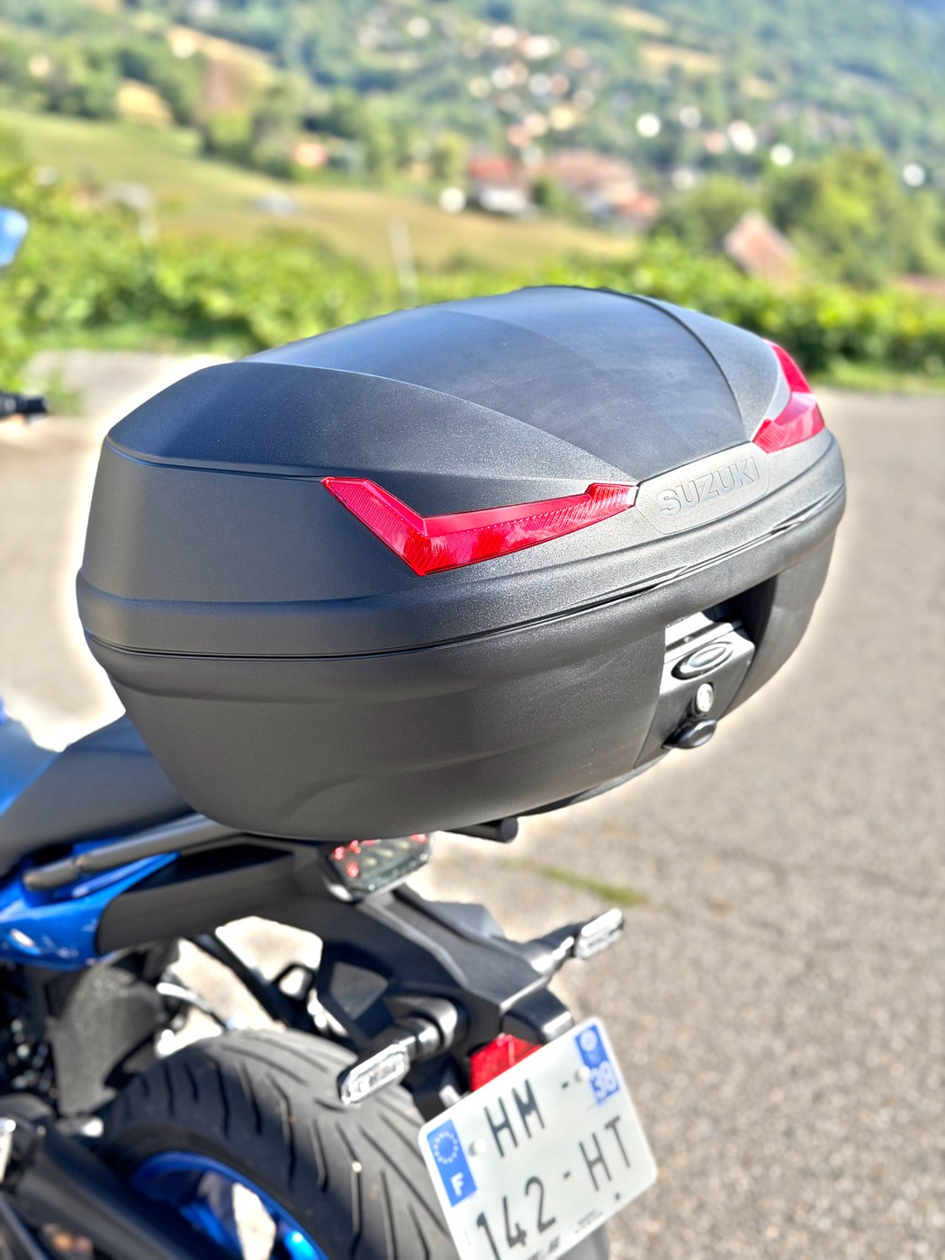 The 45-litre top case swallows a full-face helmet.